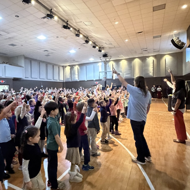 preschool students and teachers leading chapel worship