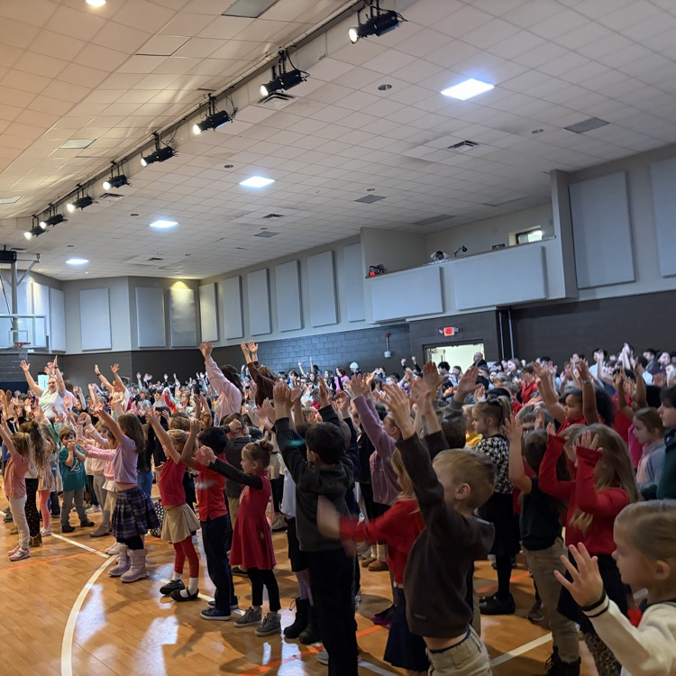 preschool students and teachers leading chapel worship