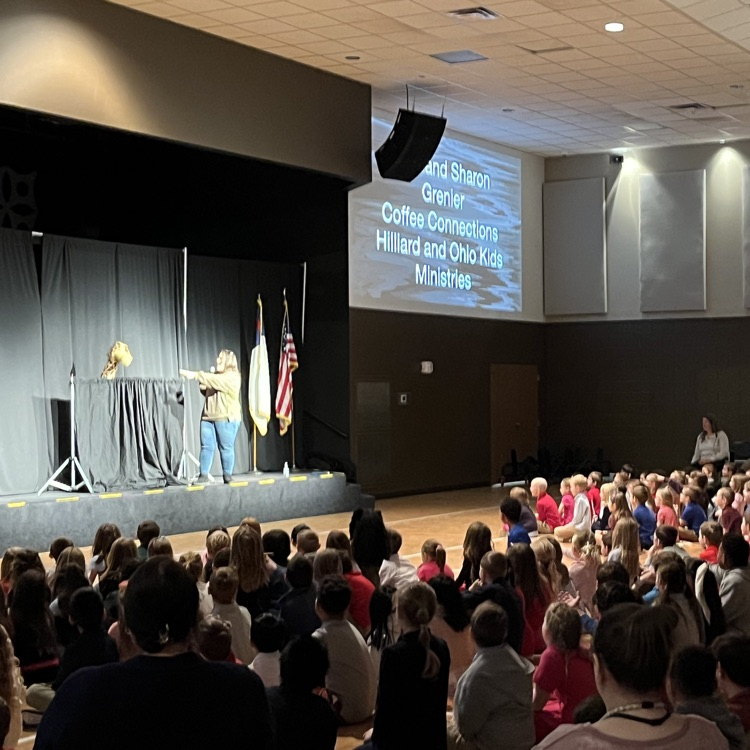 Shanon G. speaking to students in chapel