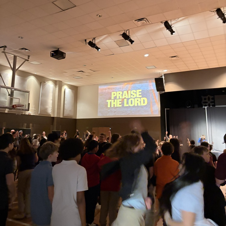 students worshipping in chapel