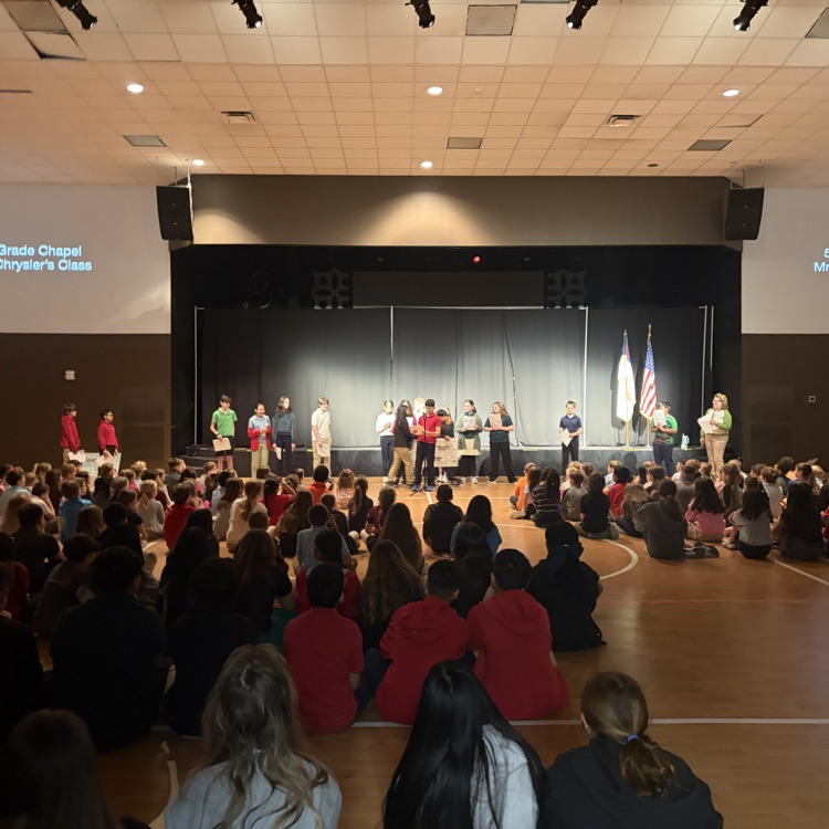 5th grade students presenting at chapel 