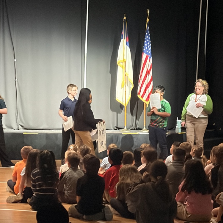 5th grade students presenting at chapel 