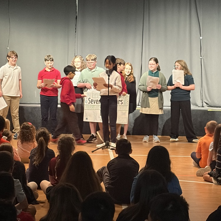 5th grade students presenting at chapel 