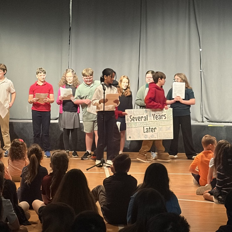 5th grade students presenting at chapel 