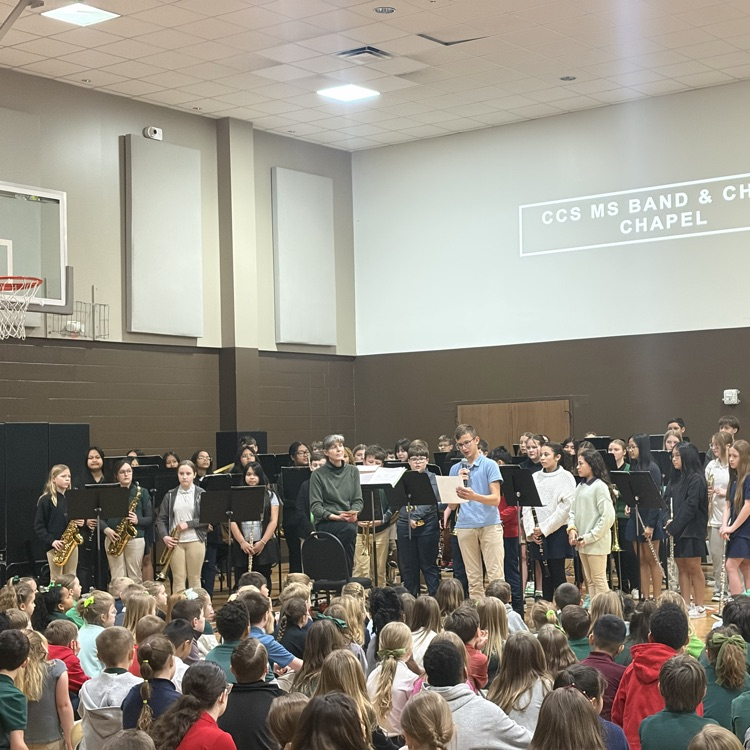 middle school band students performing 