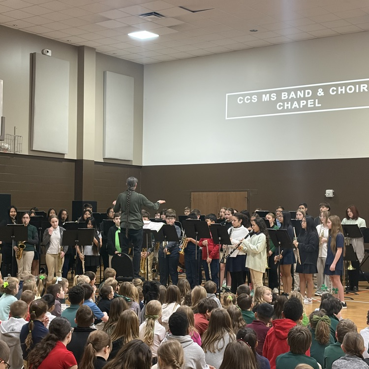 middle school band students performing 