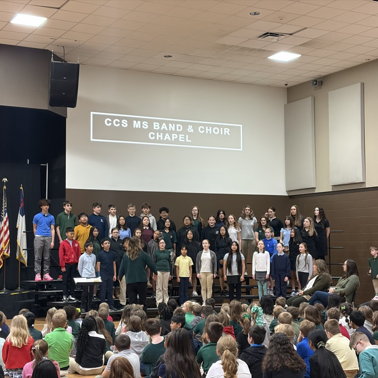 middle school choir students performing 