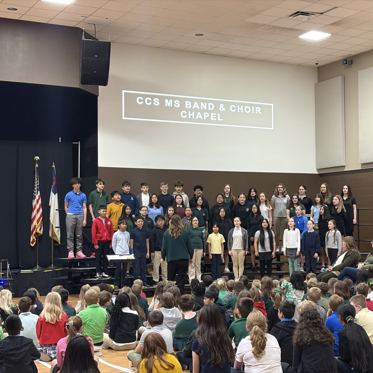 middle school choir students performing 