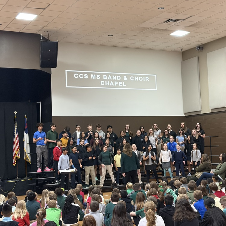 middle school choir students performing 