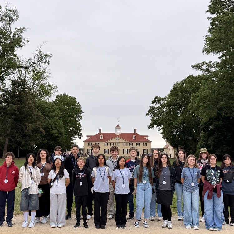 student standing in front of large home at Washington’s Mount Vernon