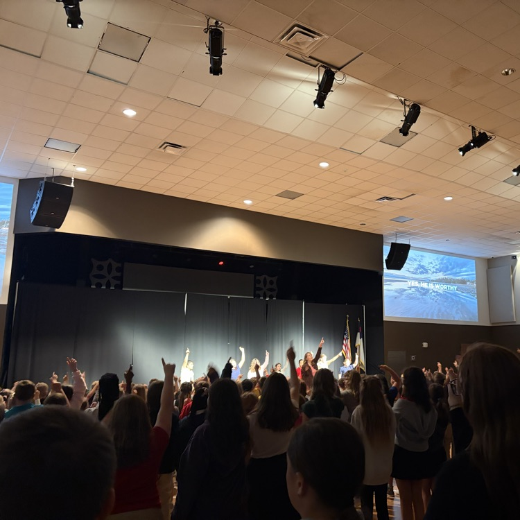 students worshipping in chapel