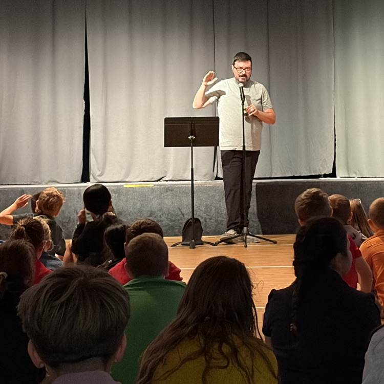 pastor Lewis speaking to students