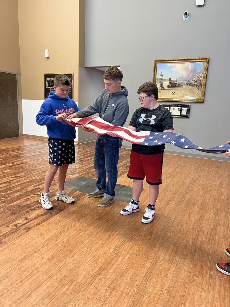 students learning flag etiquette