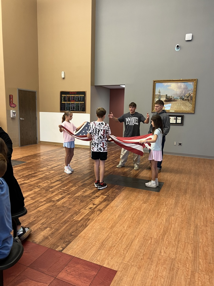 students learning flag etiquette