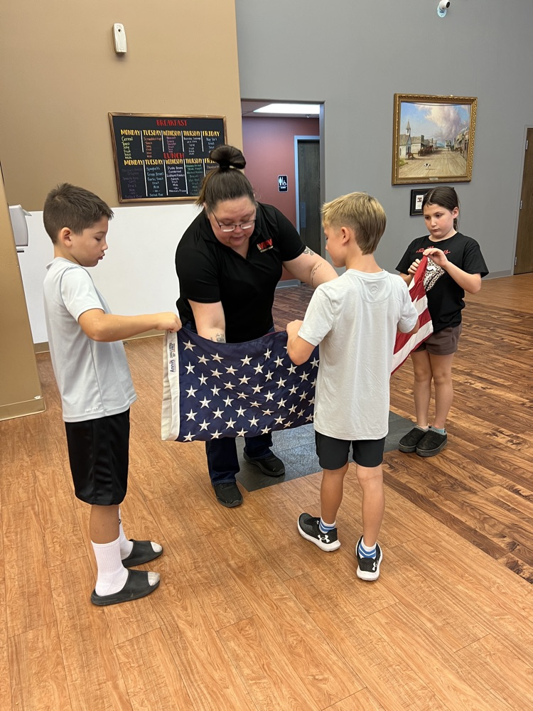 students learning flag etiquette