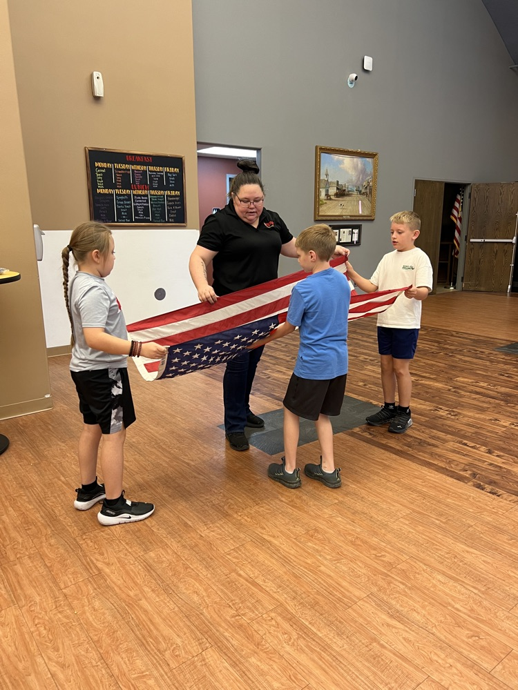 students learning flag etiquette