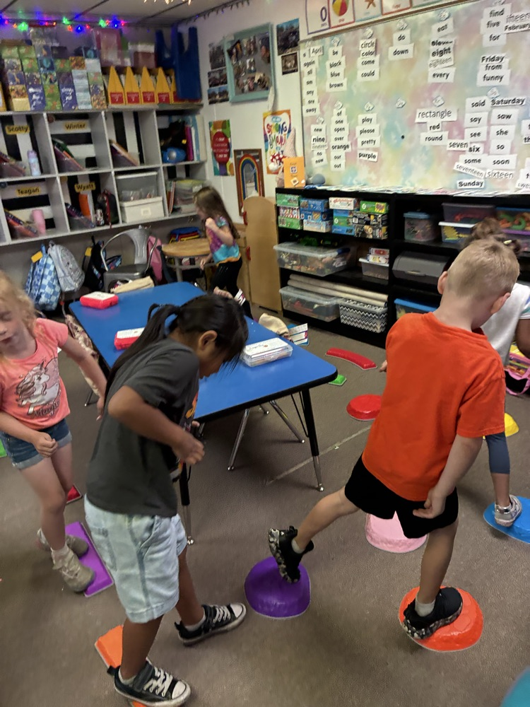 Kindergarten students enjoying centers