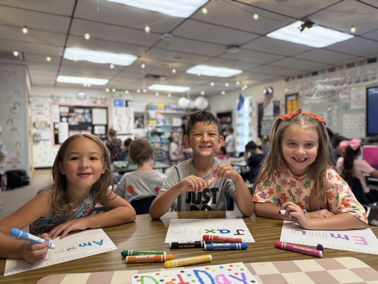 students working on dot day activities