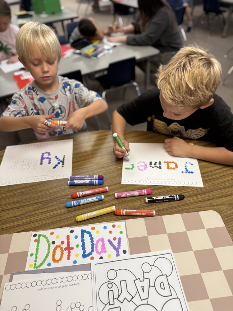 students working on dot day activities
