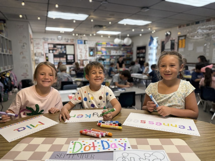 students working on dot day activities