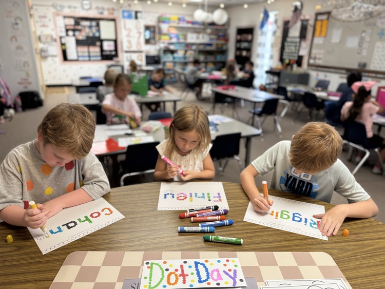 students working on dot day activities
