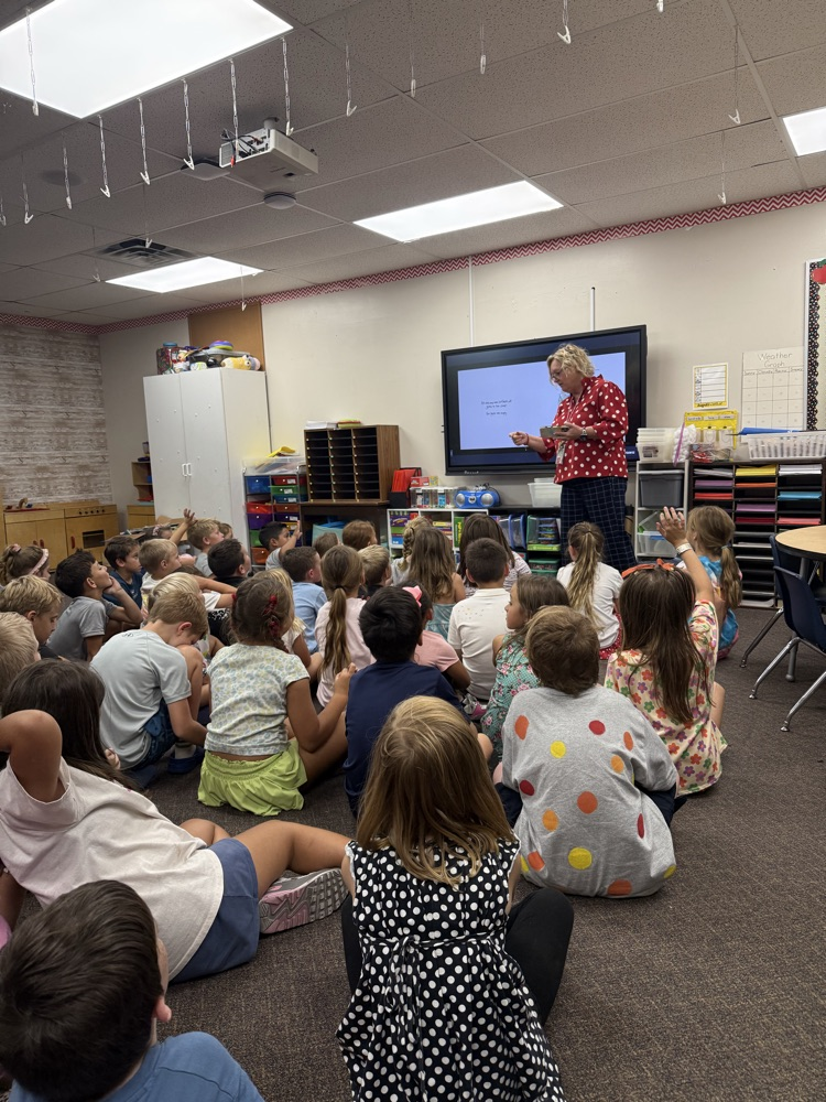 students listening to the book, The Dot