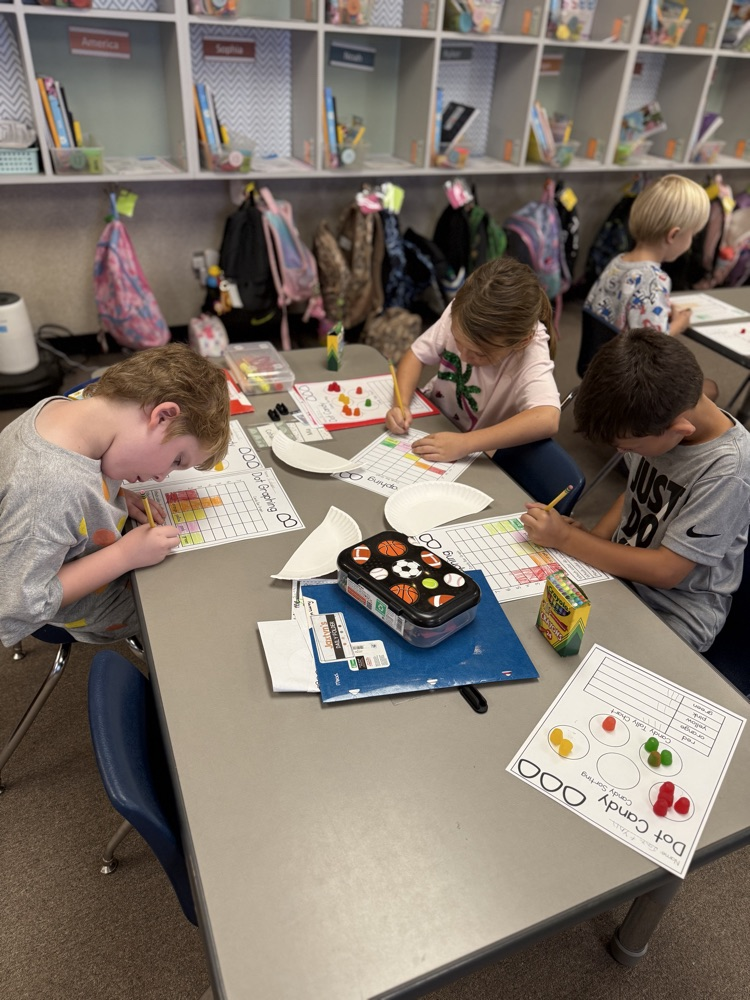 students working on dot day activities