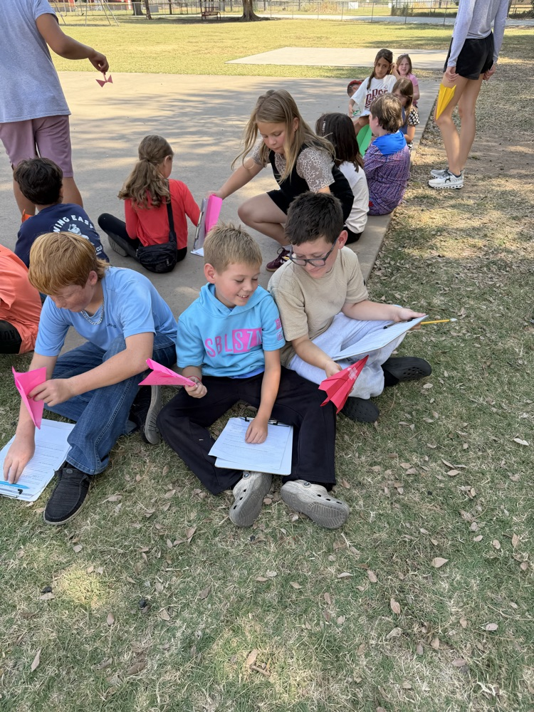 students graphing their plane’s distance