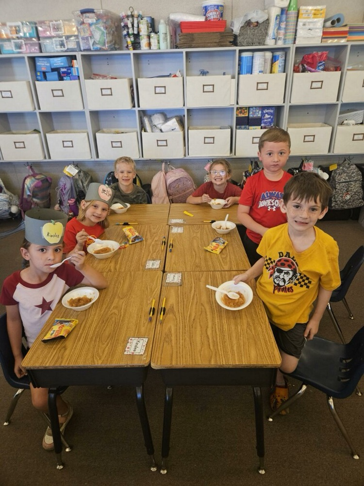 students eating an apple treat