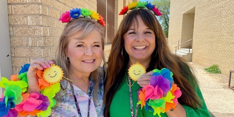 Photo of Mrs. Turner and Mrs. Wilcox dressed as Spring.