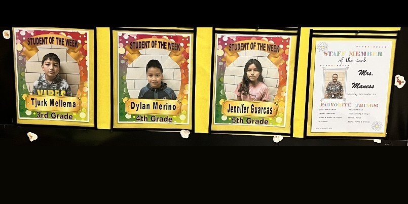 Photo of bulletin board featuring the March 27, 2023 Students and Staff of the Week. 3rd Grade, Tjurk Mellema; 4th Grade, Dylan Merino; 5th Grade, Jennifer Guarcas; and staff member