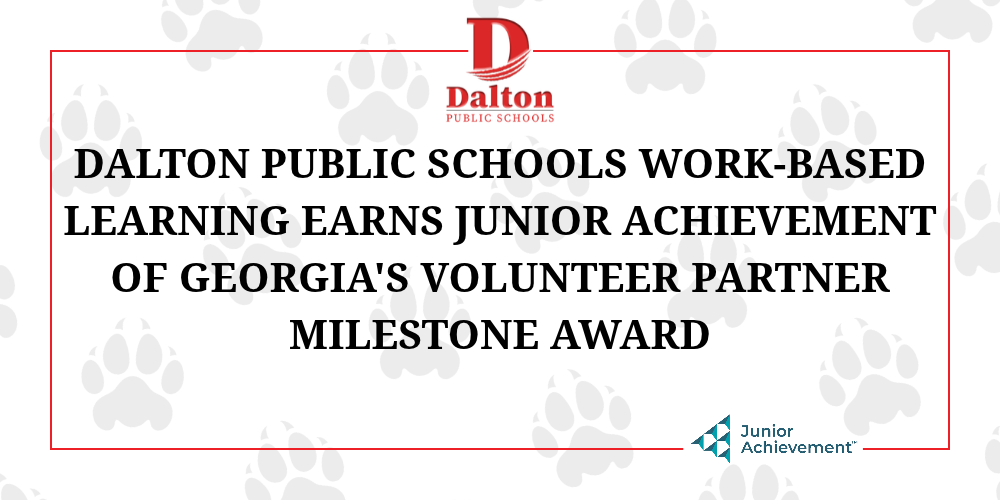 A press release banner graphic announcing that Dalton Public Schools Work-Based Learning has earned Junior Achievement of Georgia's Volunteer Partner Milestone Award.