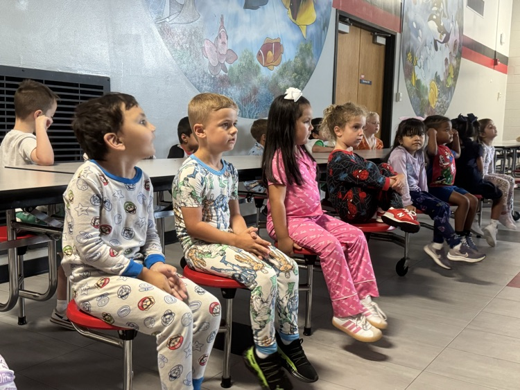 Students listening to a read aloud