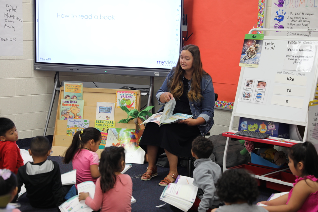 In Lauren Moses’ Kindergarten class at Blue Ridge School, students recently practiced important reading skills using their SAVVAS workbooks — learning how to turn pages and hold a book correctly while enjoying a story together!