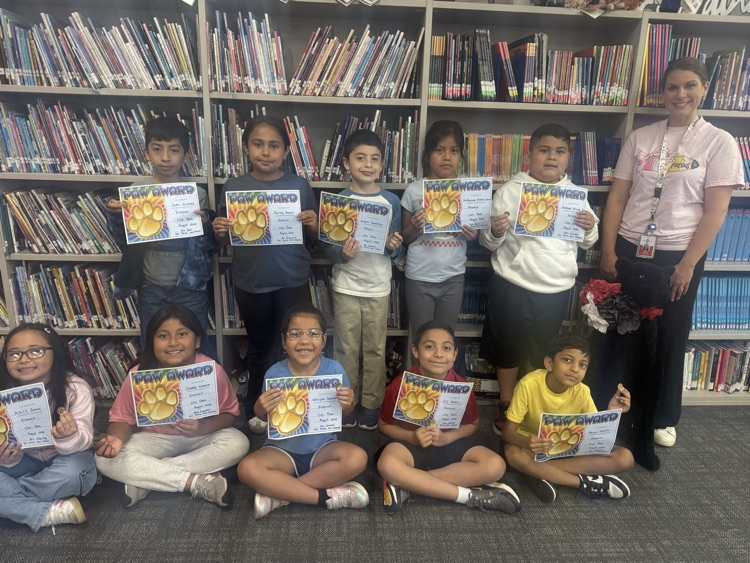 students with certificates of recognition