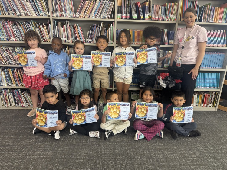 students with certificates of recognition