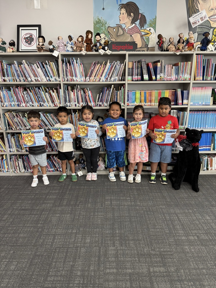 students with certificates of recognition