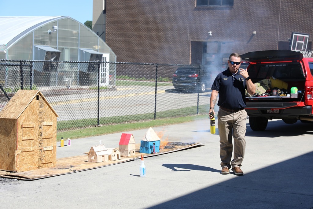 Amy Gleaton’s Forensics class at Dalton High School received funding through the Dalton Education Foundation’s Grants for Instruction program to purchase materials for engineering students to build spec houses and stick houses. Once completed, these student-built structures were used in partnership with the Dalton Fire Department Arson Unit to study fire behavior and learn important fire safety skills.