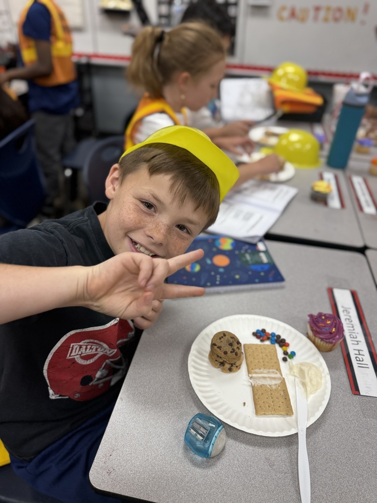 Classroom Spotlight: Fifth graders in Mrs. Mariela Vazquez’s class at Brookwood School transformed their room into an Earth Construction Zone!  Wearing yellow helmets and orange vests, students explored constructive and destructive processes that shape our planet. Using Chips Ahoy cookies, graham crackers, frosting, and chocolate chips, they modeled divergent, convergent, and transform boundaries—all inside a “caution-taped” construction zone! Hands-on learning made science come alive as students discovered how the Earth is constantly changing beneath our feet.