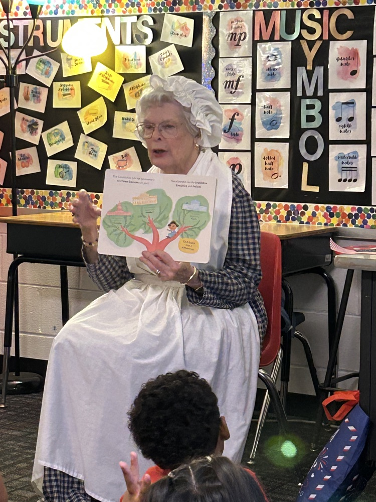 Mrs. Meek reading a book for Constitution Day