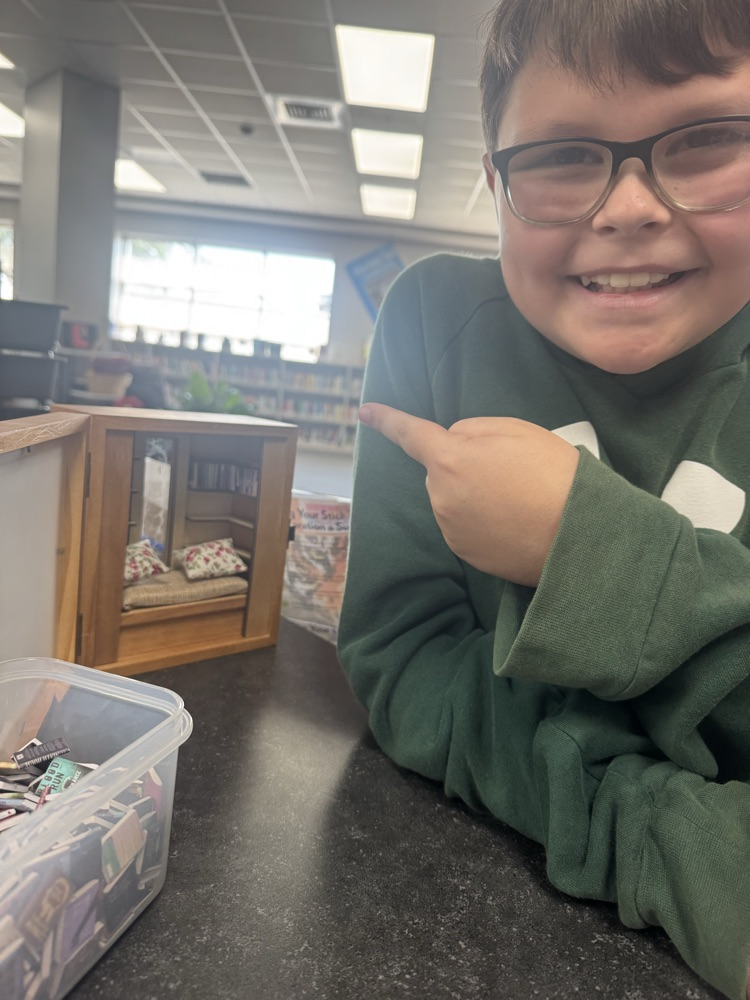 photo of boys at tiny library 