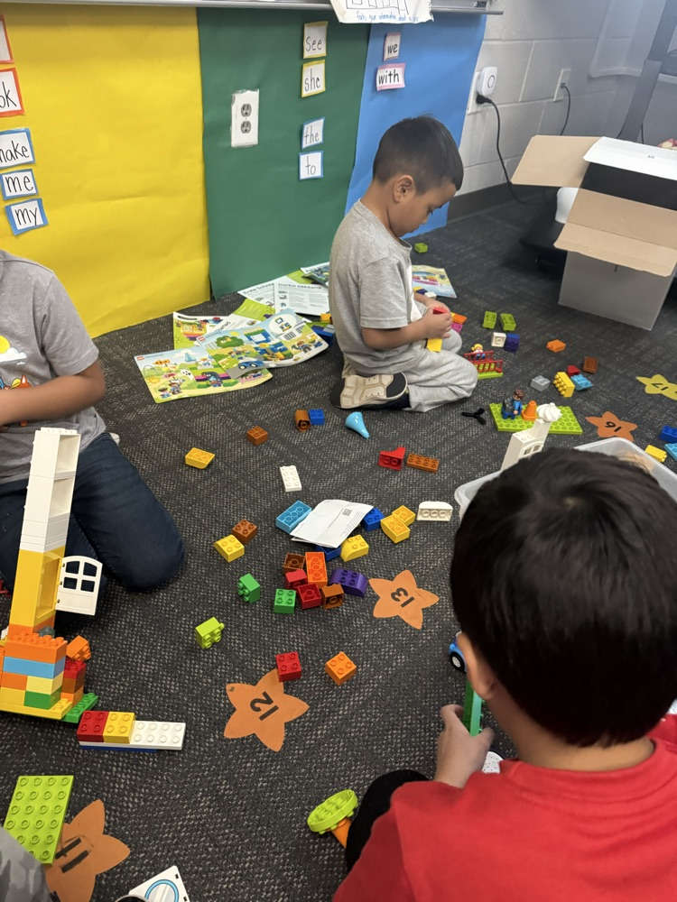 students working with legos