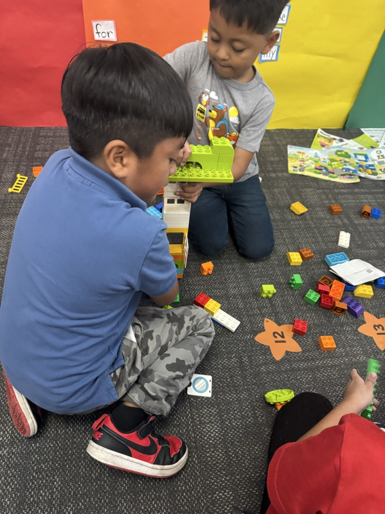 students working with legos