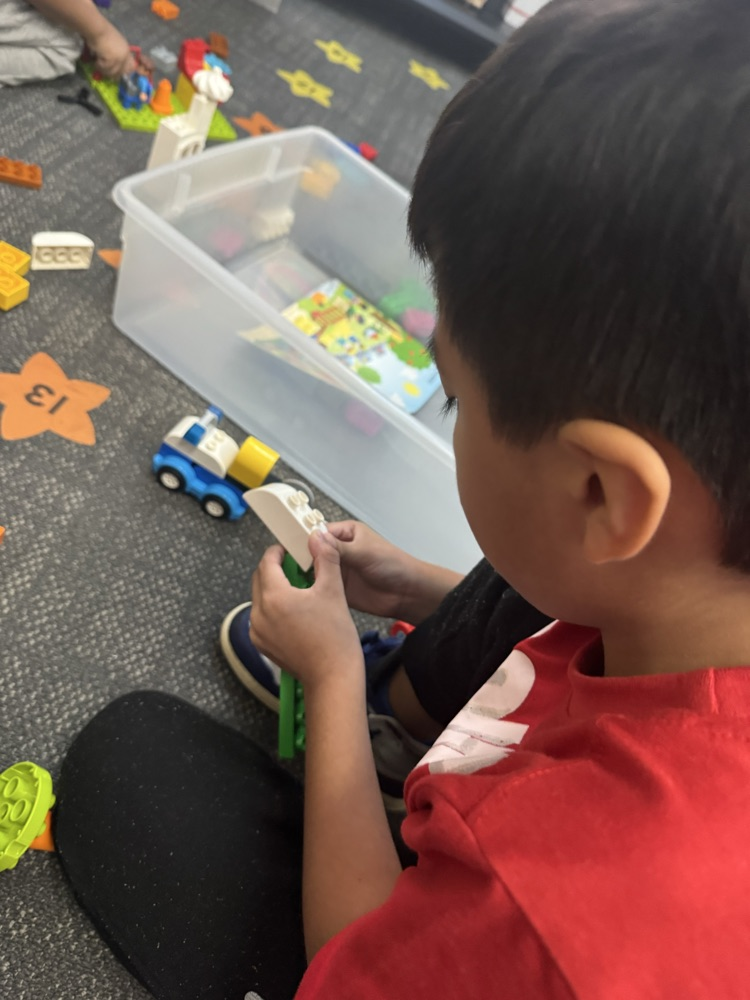 students working with legos