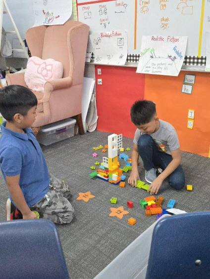 students working with legos