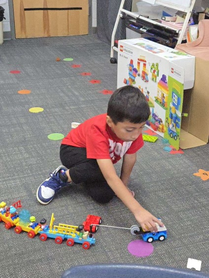 students working with legos