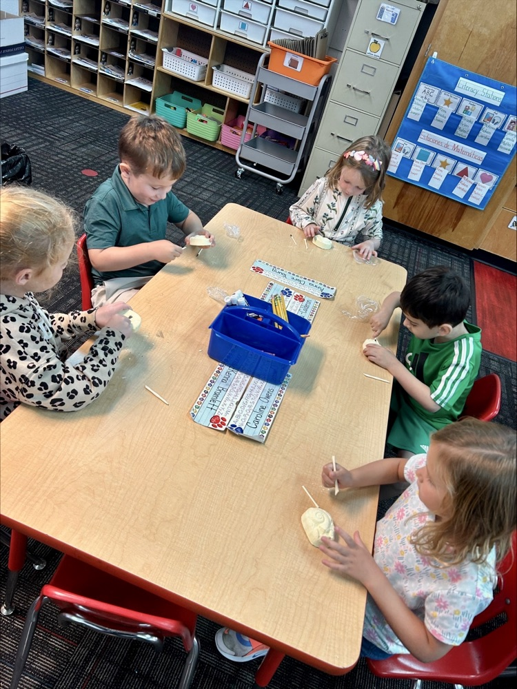 Students brushing their fossils 
