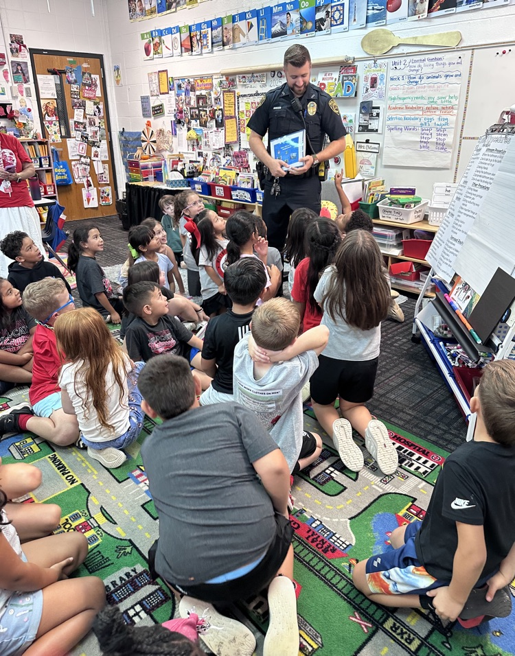 Students asking questions to Officer Warren 