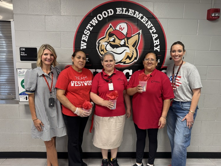 A picture of the school custodians with Mrs. Alesa and Mrs. Ridley.