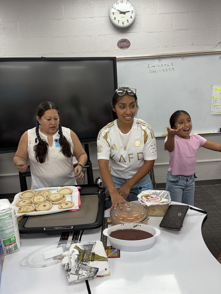 students making dish in classroom 